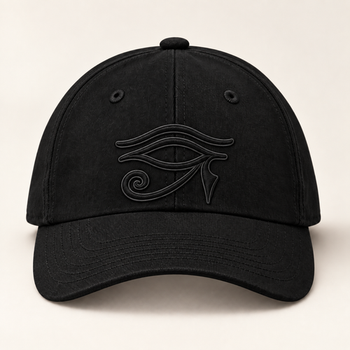 Front view of the black ORA Eye of Horus cap with tonal eye embroidery.