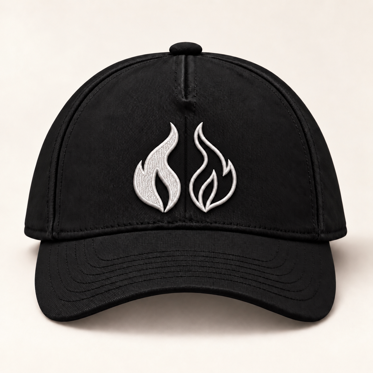Front view of the black ORA Ash and Ember cap with paired flame embroidery on a neutral background.